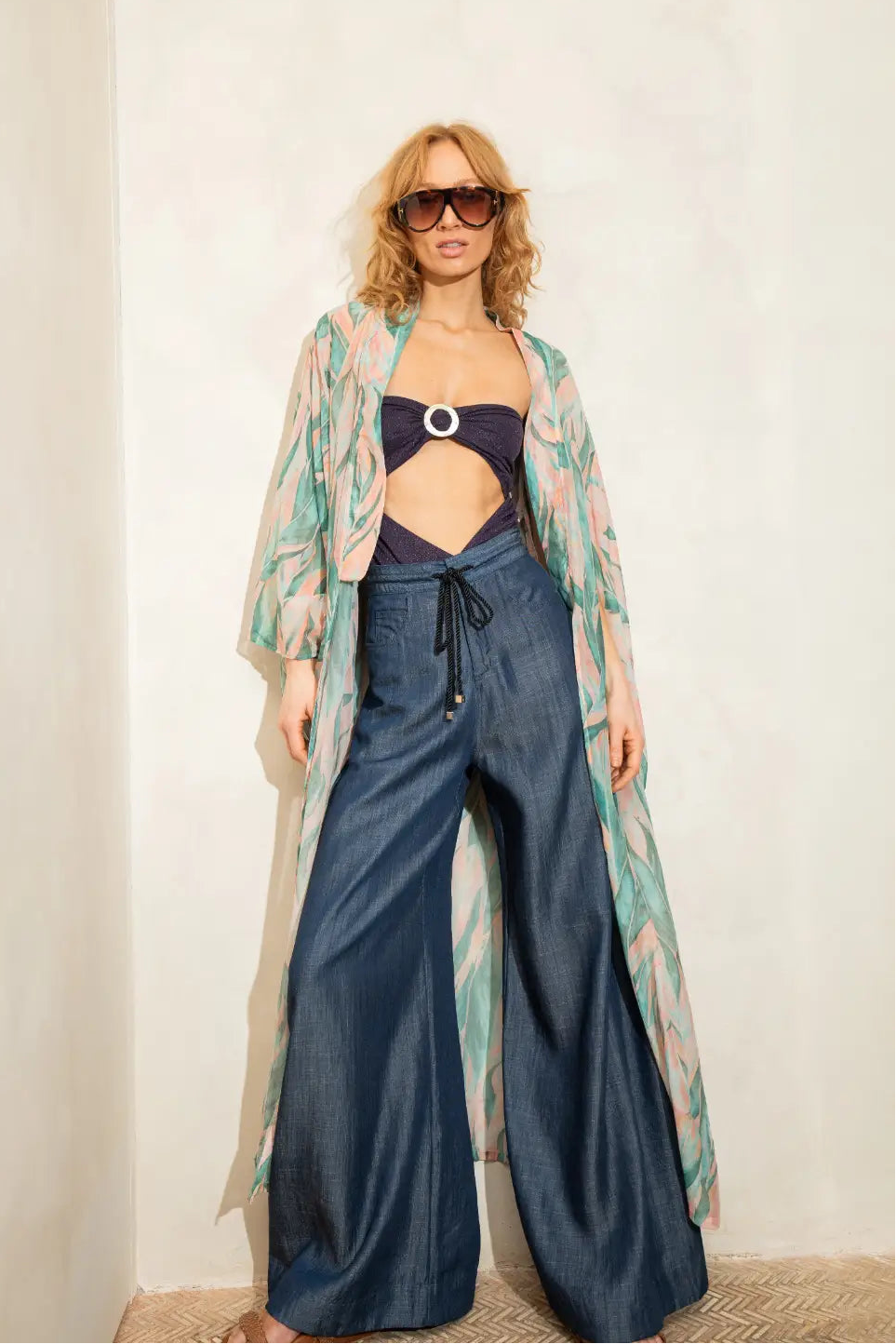 Kyoto kimono in botanical print styled with Nabila one-piece bathing suit, Hera wide leg pants and Margot heels, front view - worn by model
