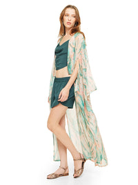 Kyoto maxi kimono featuring a botanical print in aqua, blush pink and ivory, styled with Maz top, Caravan shorts and Margot flats, side view - worn by model