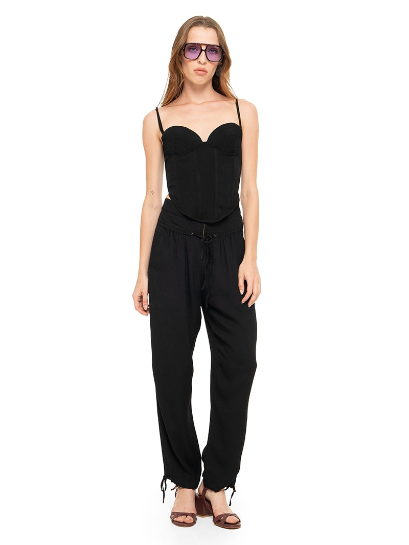 Luma pants in black styled with Anggie bustier top and Esther heels, front view - worn by model