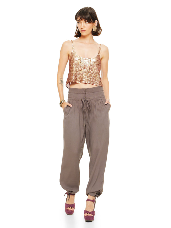 Luma pants in elephant warm grey taupe styled with Hora beaded tank top and Betty heels, front view - worn by model
