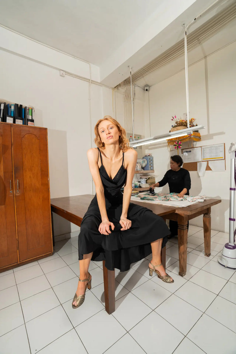 Maz maxi dress in black styled with Alegra beaded bra worn by model at Lily Jean's atelier