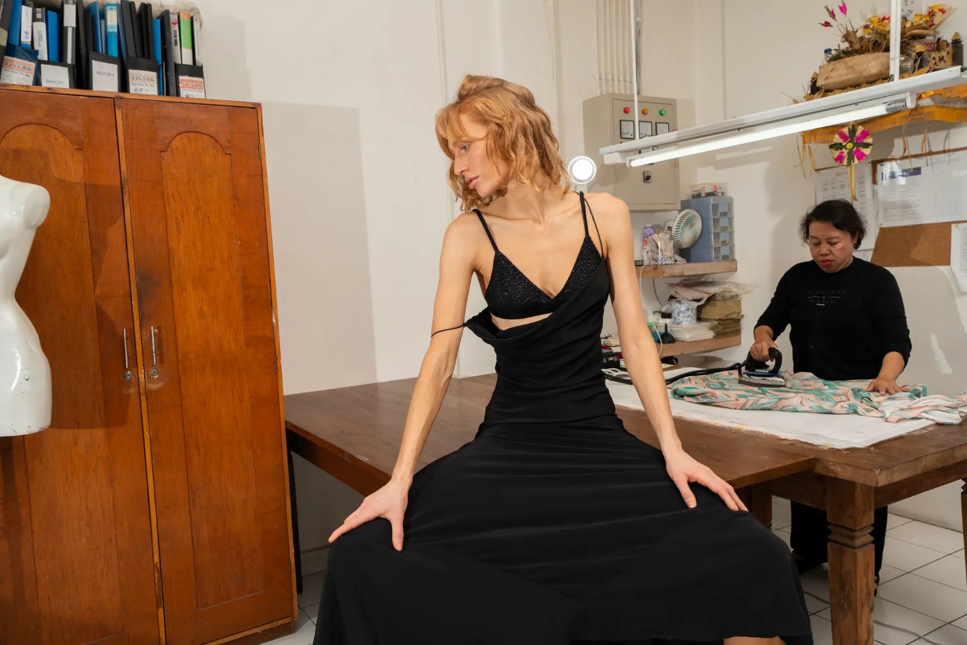 Maz maxi dress in black styled with Alegra beaded bra worn by model at Lily Jean's atelier