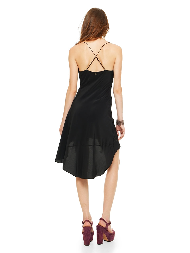 Maz mini black dress styled with Betty heels, back view - worn by model