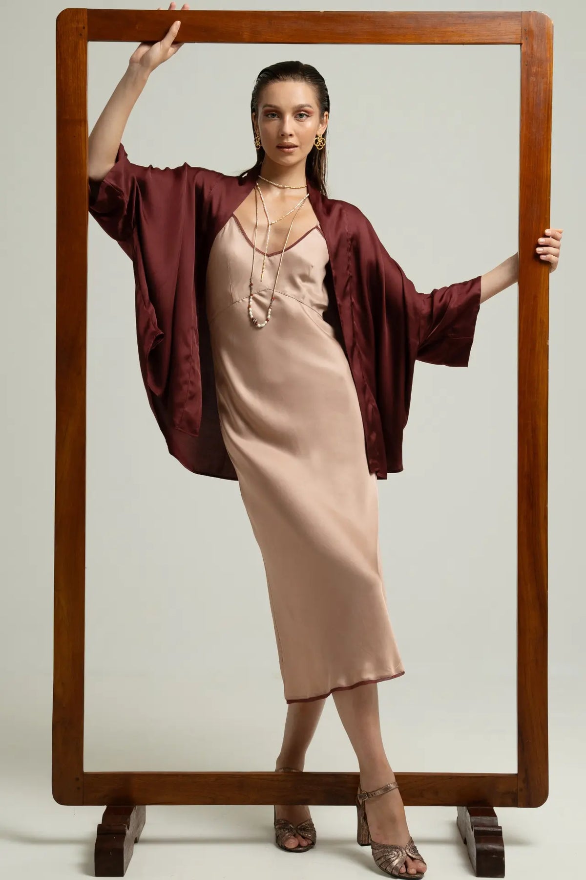 Melody Slip Dress in Wood Rose styled with Isyana Kimono in Wine color and Margot Heels, front view - worn by model