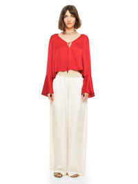 Nova pants in vanilla color styled with Rama top and Margot heels, front view - worn by model
