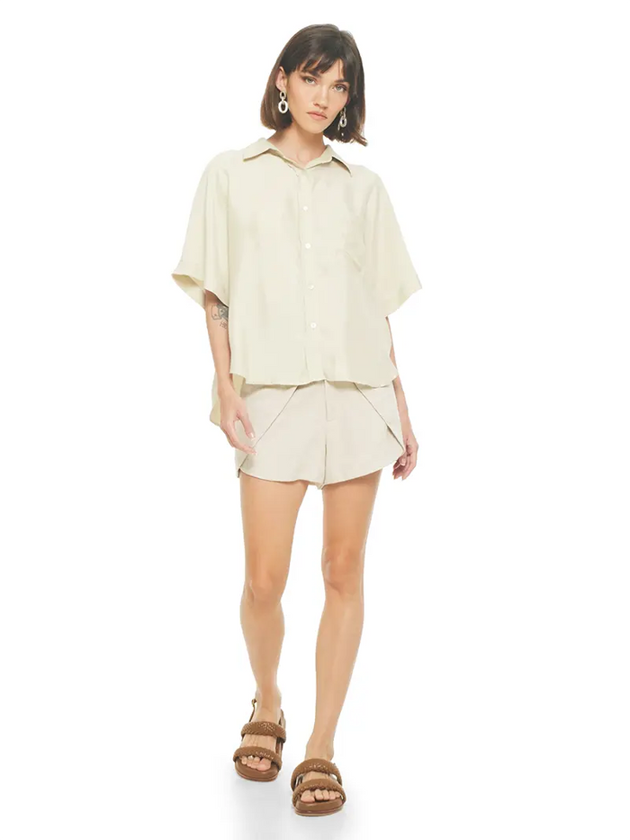 Paris shirt in beige styled with Dani shorts and Charlie flats, front view - worn by model