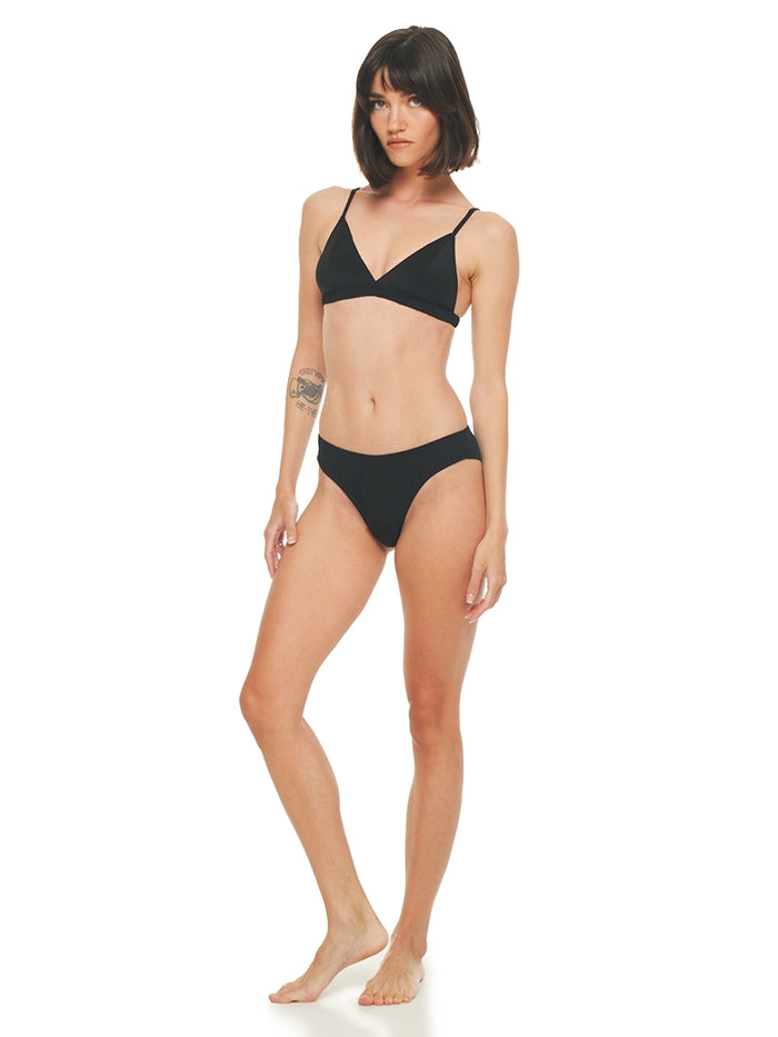 Polie bra and undies in black, front view - worn by model