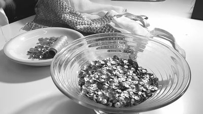 Sequin attachment process during the making of the Hornet Top