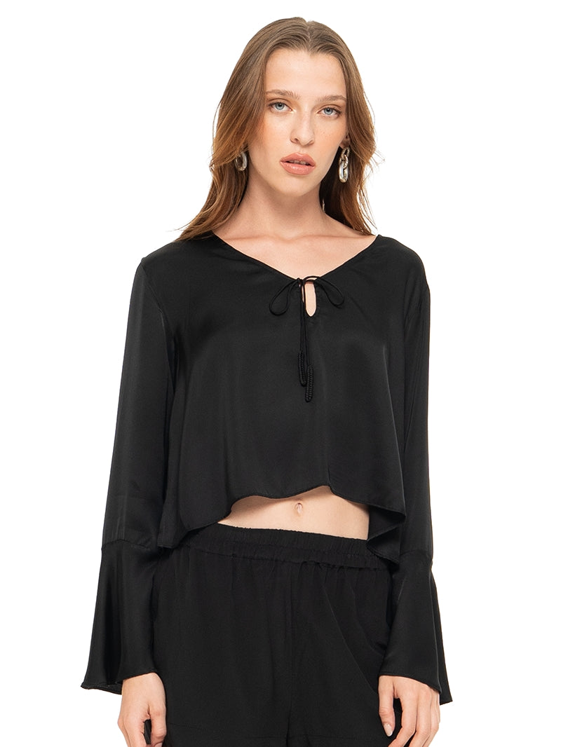 Rama top in black styled with Caravan shorts and Margot flats, front close view - worn by model