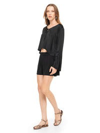 Rama top in black styled with Caravan shorts and Margot flats, quarter front view - worn by model