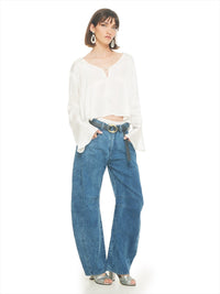 Rama top in natural styled with Catch jeans pants and Margot heels, front view - worn by model