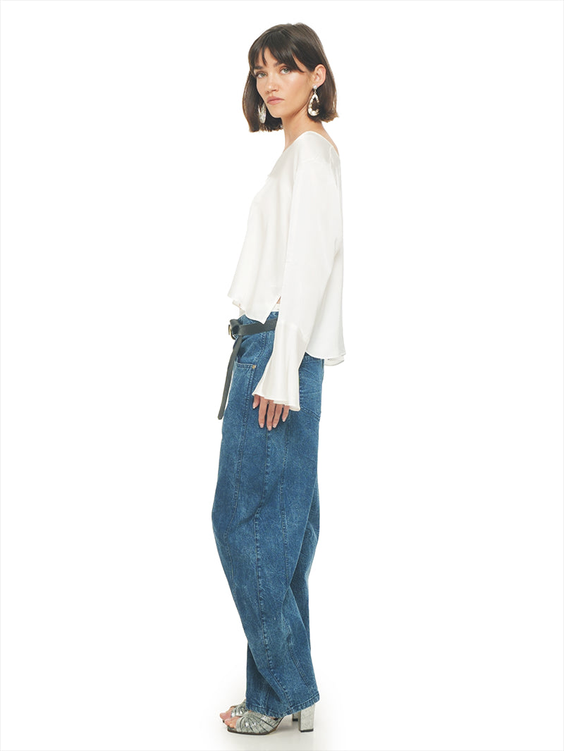 Rama top in natural styled with Catch jeans pants and Margot heels, side view - worn by model