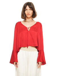 Rama top in red styled with Nova pants, front close view - worn by model