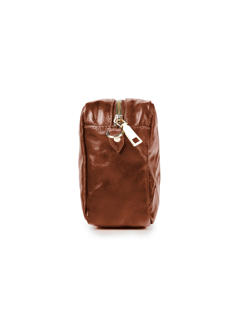 Rimba leather shoulder bag with a diamond-quilted pattern, featuring matching detachable shoulder and crossbody straps with gold-tone hardware - ghost side view