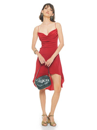Maz mini dress in red styled with Margot heels and Rimba bag pine green, front view - worn by model