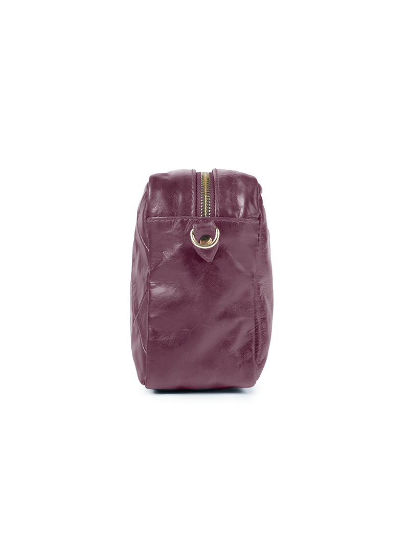 Rimba leather shoulder bag with a diamond-quilted pattern, featuring matching detachable shoulder and crossbody straps with gold-tone hardware - ghost side view