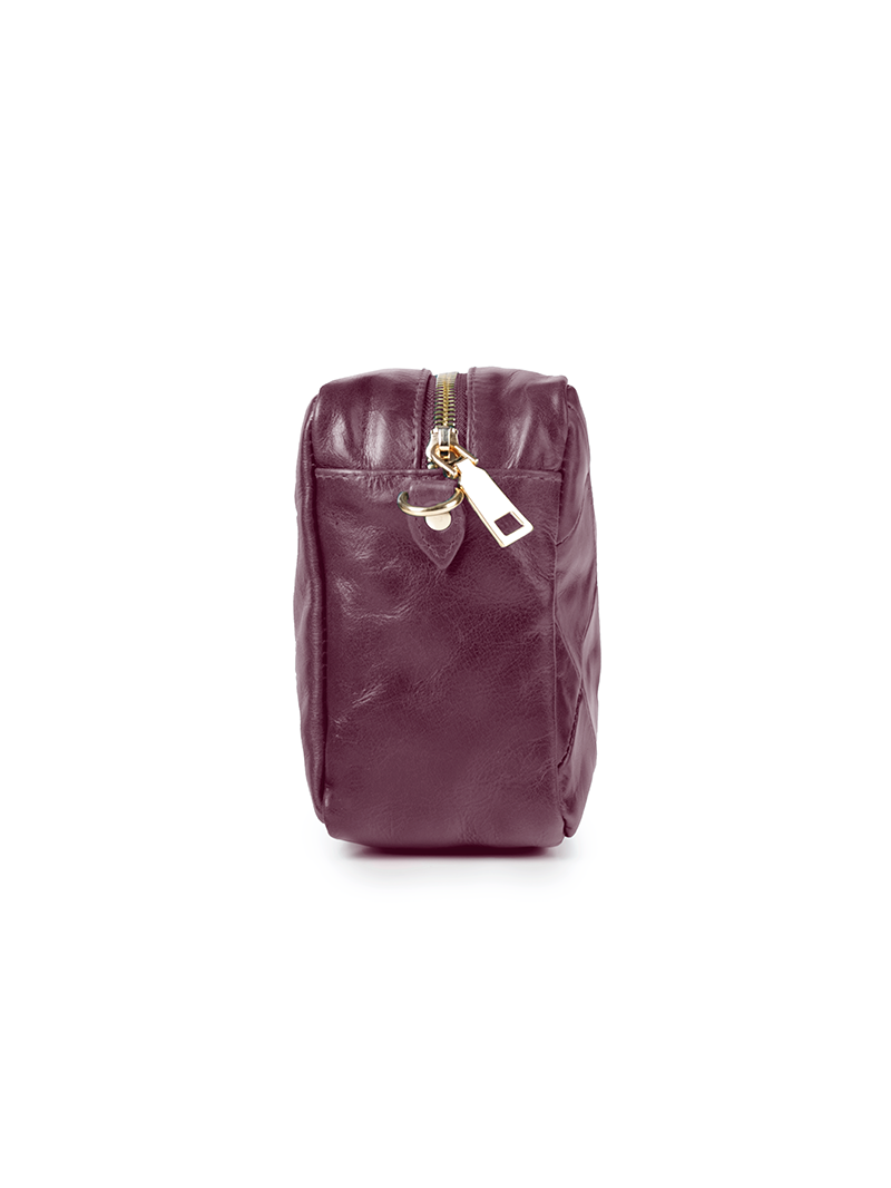 Rimba leather shoulder bag with a diamond-quilted pattern, featuring matching detachable shoulder and crossbody straps with gold-tone hardware - ghost side view