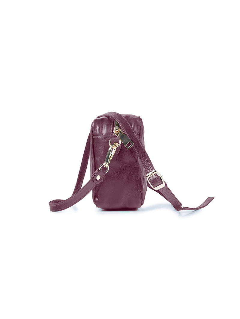 Rimba leather shoulder bag with a diamond-quilted pattern, featuring matching detachable shoulder and crossbody straps with gold-tone hardware - ghost side view