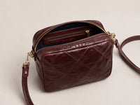 Rimba leather shoulder bag with a diamond-quilted pattern in wine color - ghost front upper view