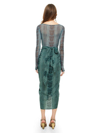 Shakti midi skirt in snake blue print styled with Boga bodysuit and Margot heels, back view - worn by model