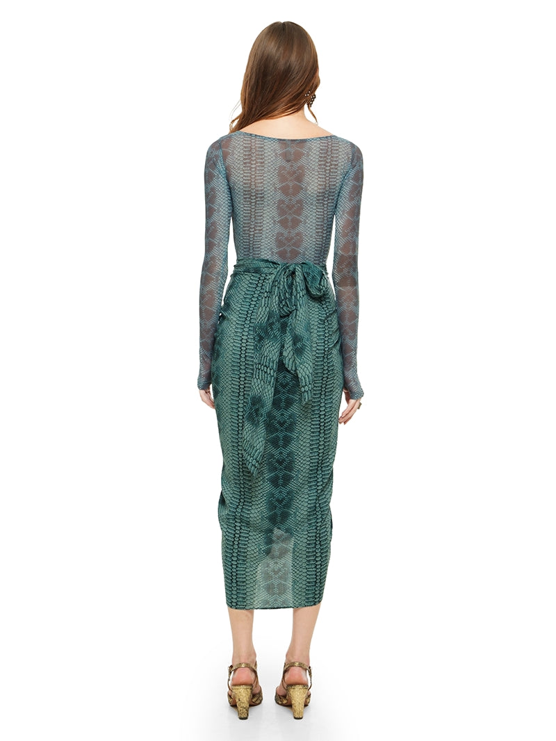 Shakti midi skirt in snake blue print styled with Boga bodysuit and Margot heels, back view - worn by model