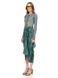 Shakti midi skirt in snake blue print styled with Boga bodysuit and Margot heels, quarter front view - worn by model