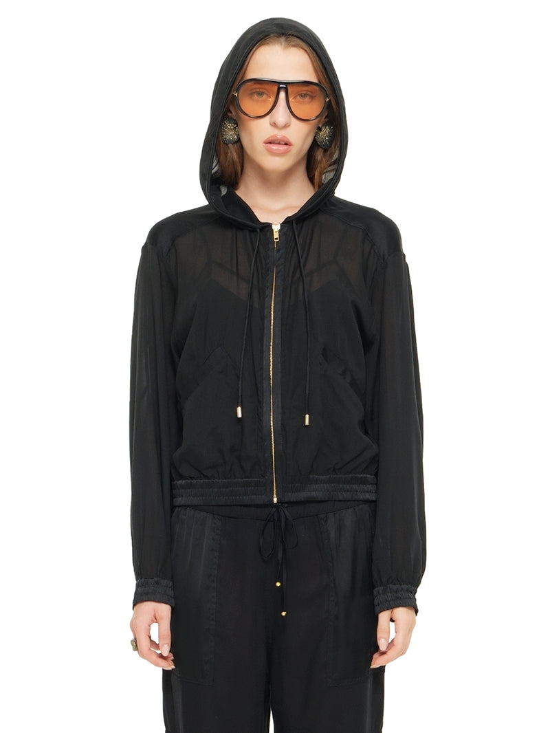 Sheer bomber jacket in black styled with Dega bodysuit, and Cargo pants, front close view - worn by model