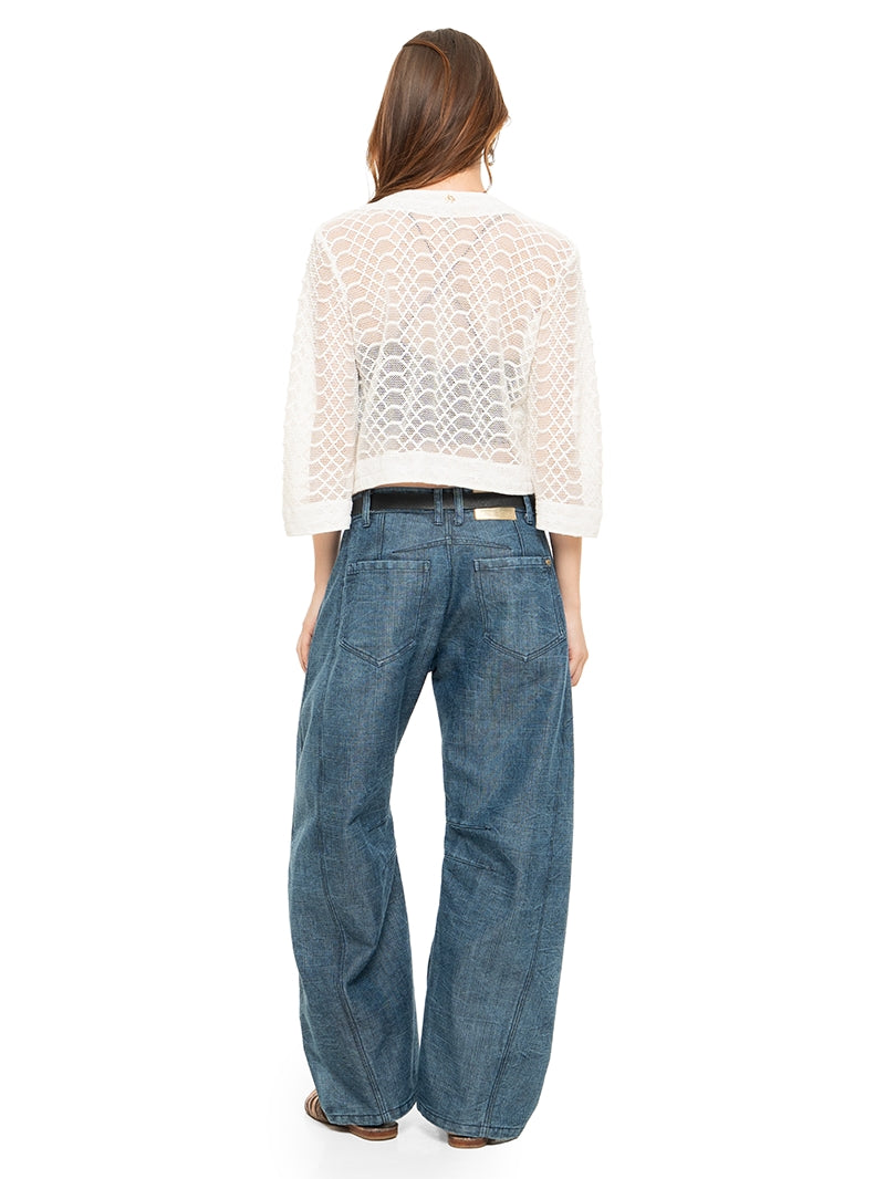 Snake bolero in white styled with Maz top black, Snap jeans pants, and Margot flats, front view - worn by model