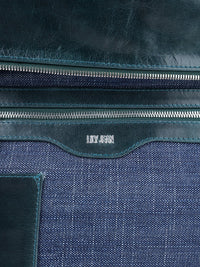 Victoria leather bag in pine green - ghost inner branding view