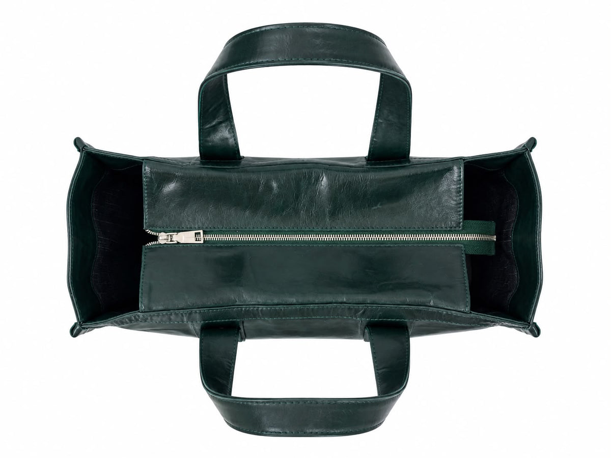 Victoria leather tote bag in pine green - ghost top view